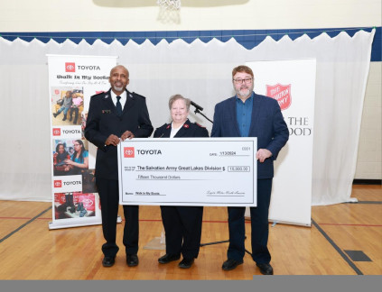 Curt McAllister Toyota Presents 15000 check to Envoy Artie Lewis and Major Toni Dorrell TSA